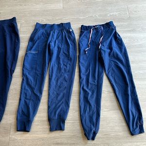 4 xs scrub pants. 3 blue 1 red